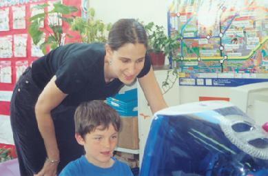 kid using iMac